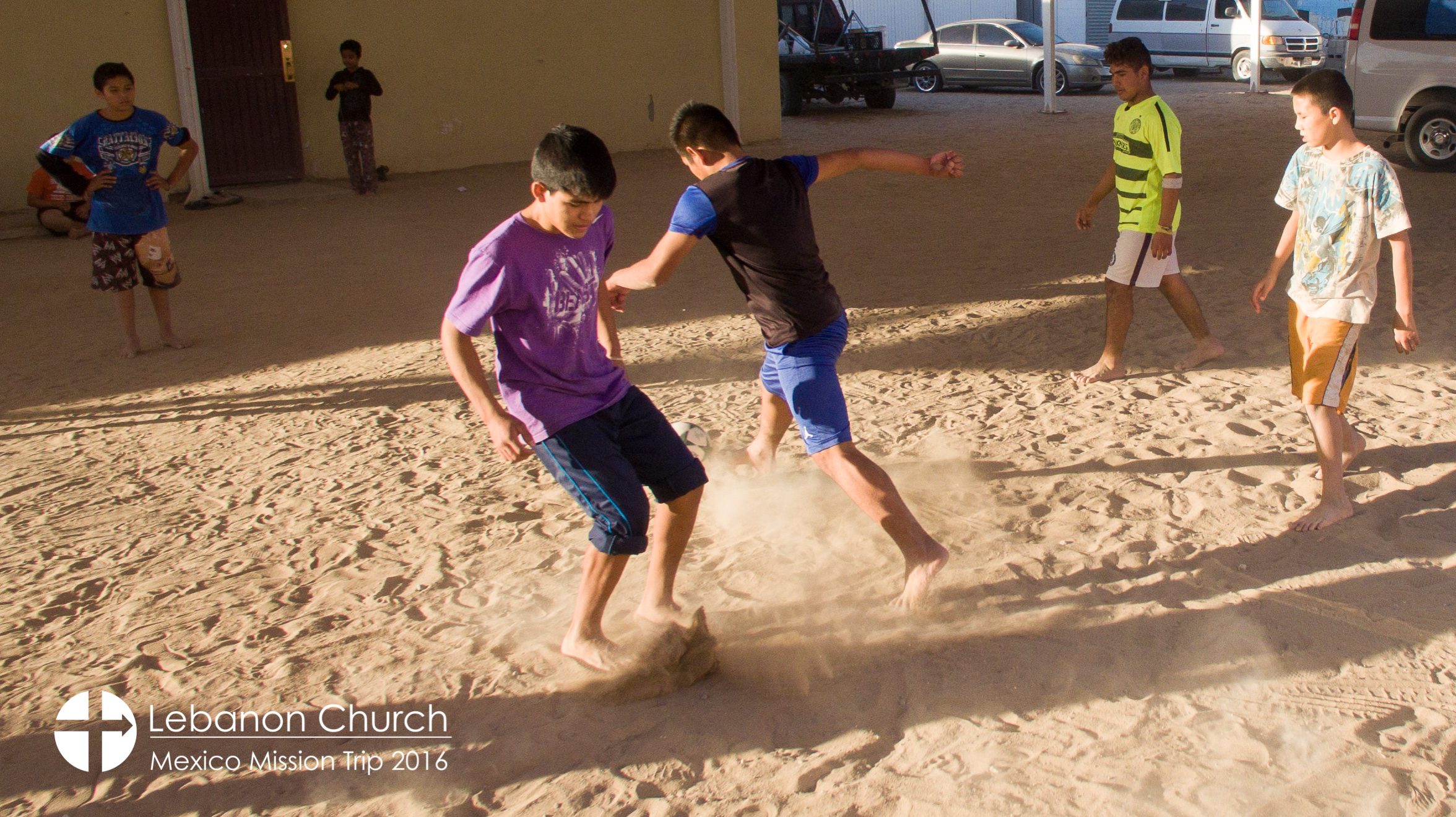 Boys playing soccer at Oasis