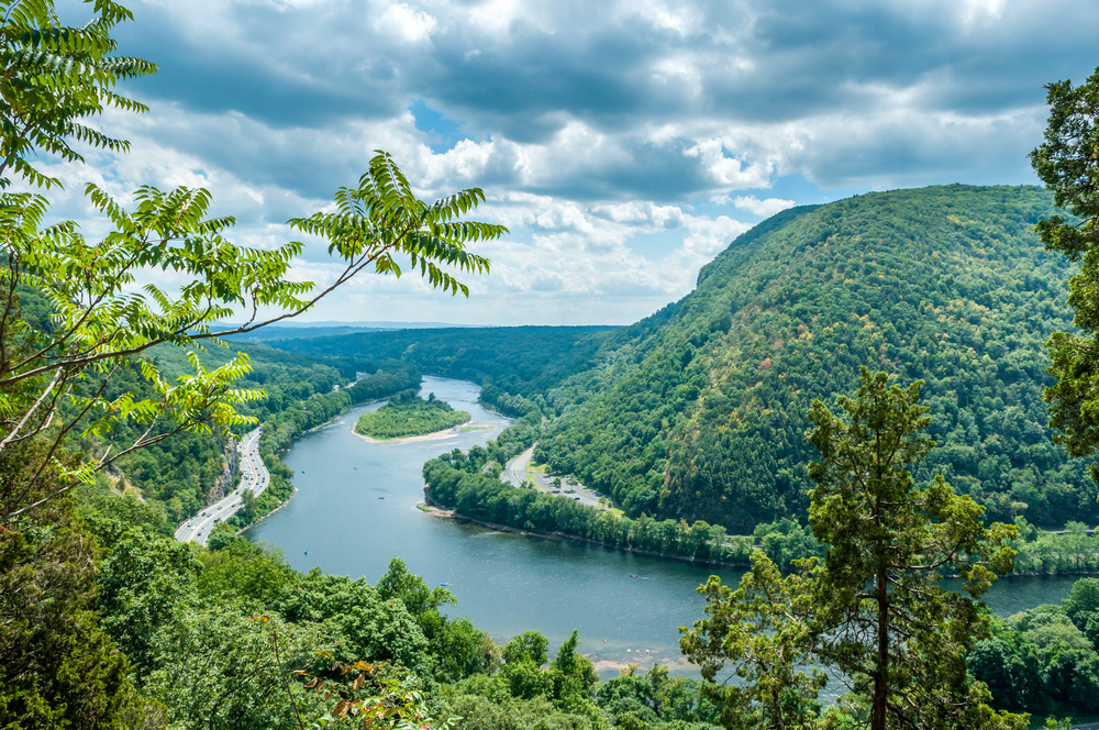 The River, the Valley, and You Paddlers slip down the river between low forested mountains; anglers wade the trout streams; hikers scan the valley from the ridge or peer into the 1000-foot-deep Water Gap. The valley has known human hand and voice for 10,000 years. Floodplains nourished the Native farmer; waterfalls drew the Victorian vacationer. Today, a 70,000-acre park welcomes those who seek the outdoors close to home. For more information about visiting the Delaware Water Gap, follow this link; http://www.nps.gov/dewa/index.htm