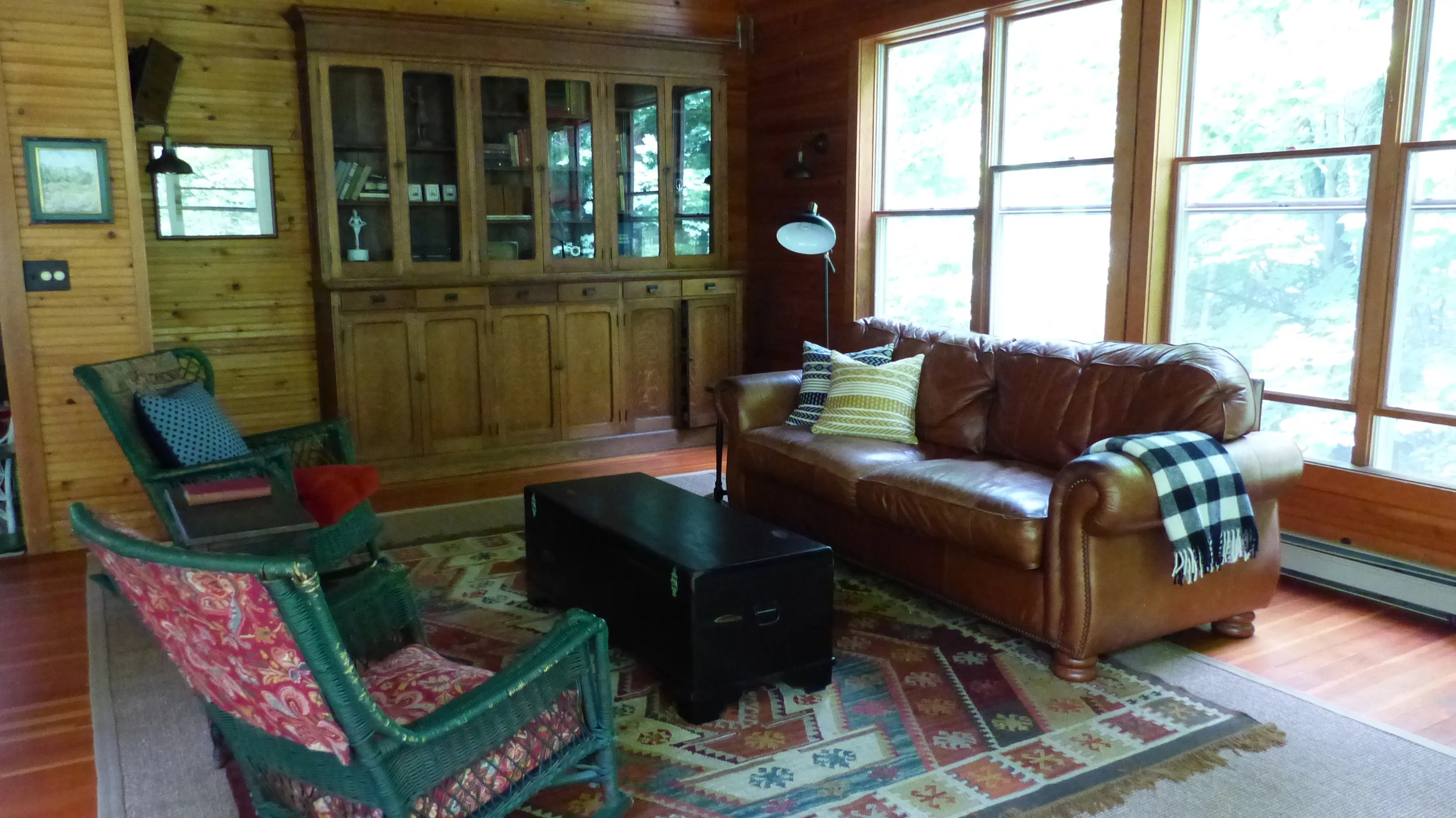 New layered rugs. Lacquered and shabbied chest. New pillows, throws and lighting. 