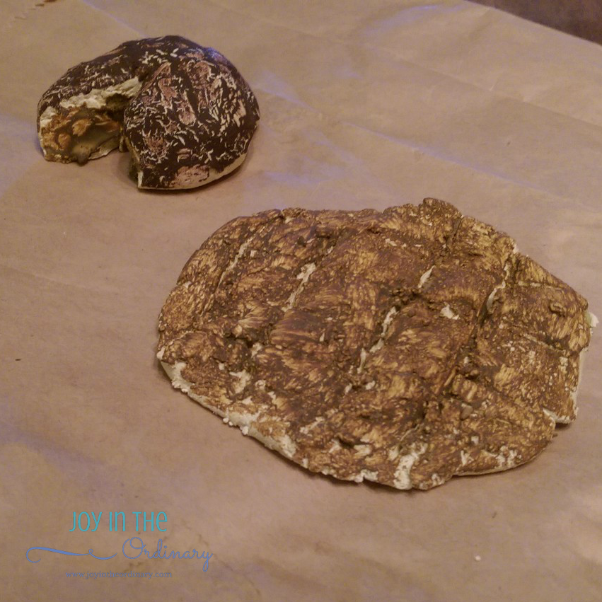 The girls had food on the brain when they sculpted these pieces. One is a Reese's Peanut butter cup and the other is a waffle.