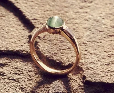 Green cats eye emerald with diamonds.jpg