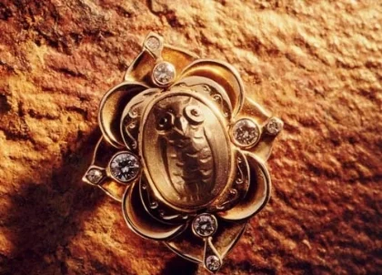 Tourmaline carved owl and diamond gold pin.jpg