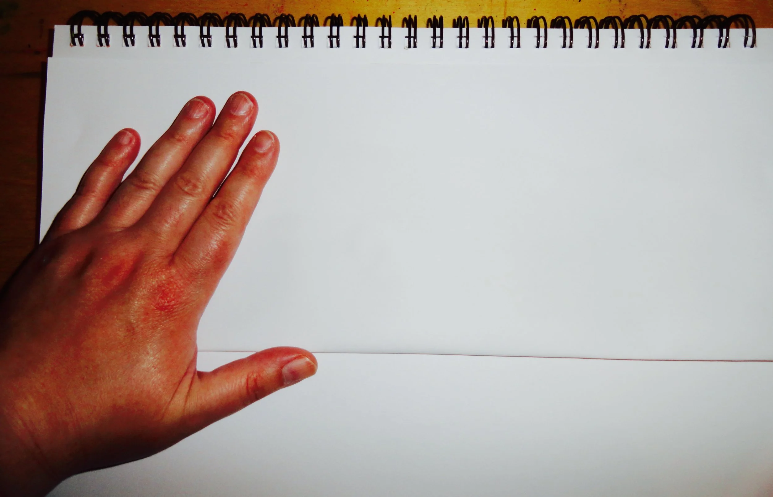 fold the paper and press down evenly across the page