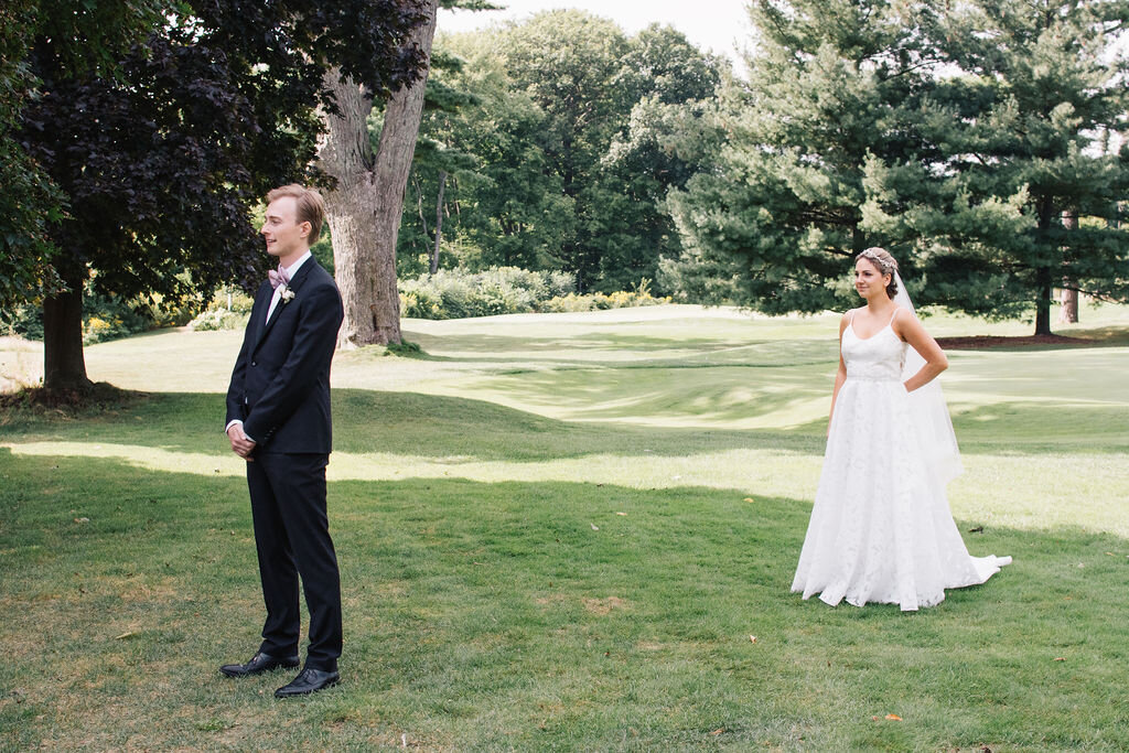 Bride and groom's elegant first look at the Toronto Golf Club on their wedding day photographed by Toronto Wedding Photographers, Ugo Photography