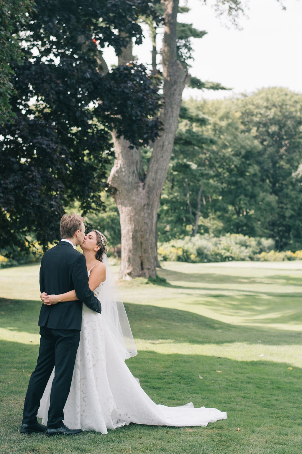 Bride and groom's emotional first look on their wedding day at the Toronto Golf Club photographed by Toronto Wedding Photographers, Ugo Photography