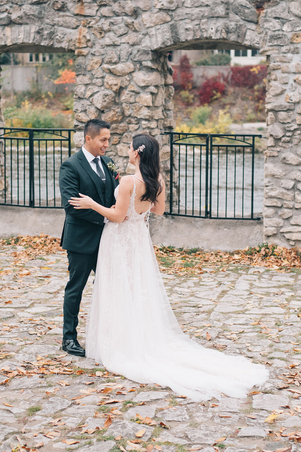 Bride and groom's joyful first look on their wedding day at Cambridge Mill photographed by Toronto wedding photographers, Ugo Photography