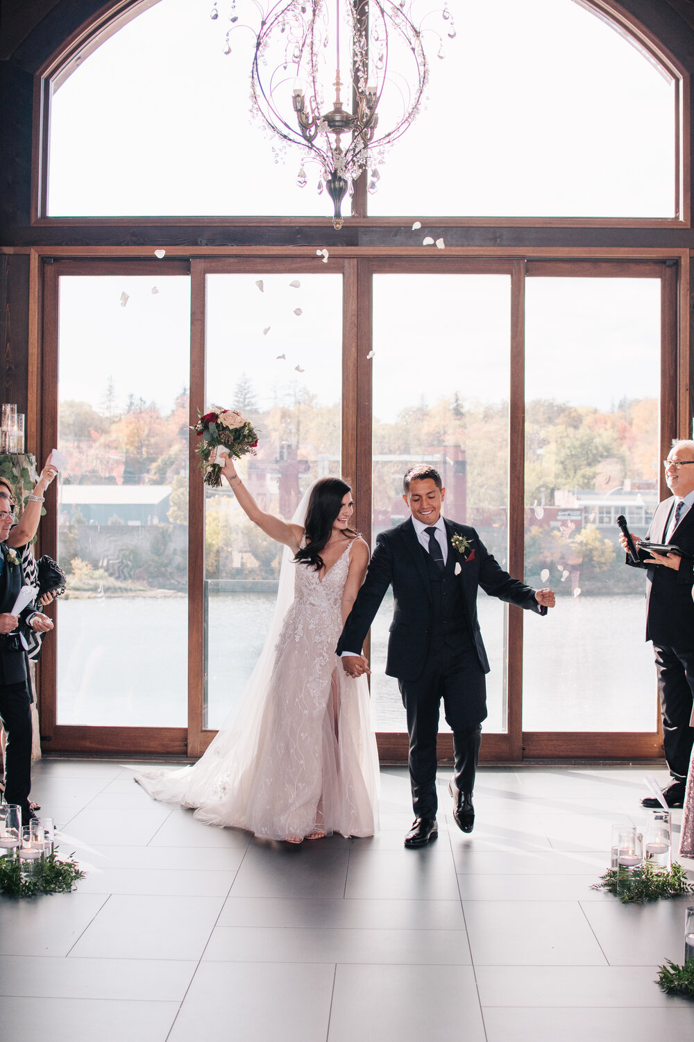 Joyous fall wedding day at Cambridge Mill photographed by Toronto wedding photographers, Ugo Photography