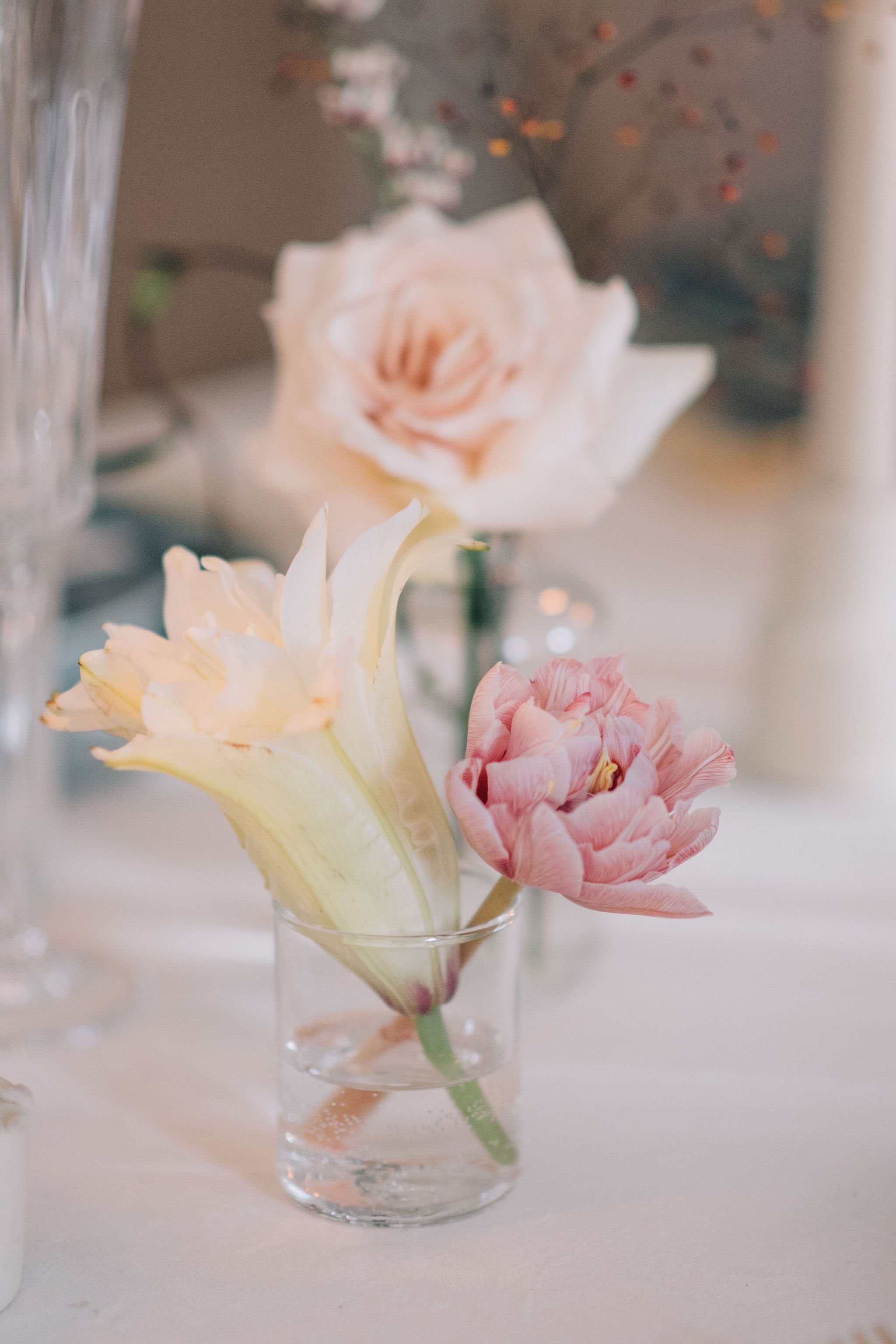 Delicate spring blooms for an intimate wedding dinner in the heart of downtown Toronto photographed by Toronto wedding photographers, Ugo Photography