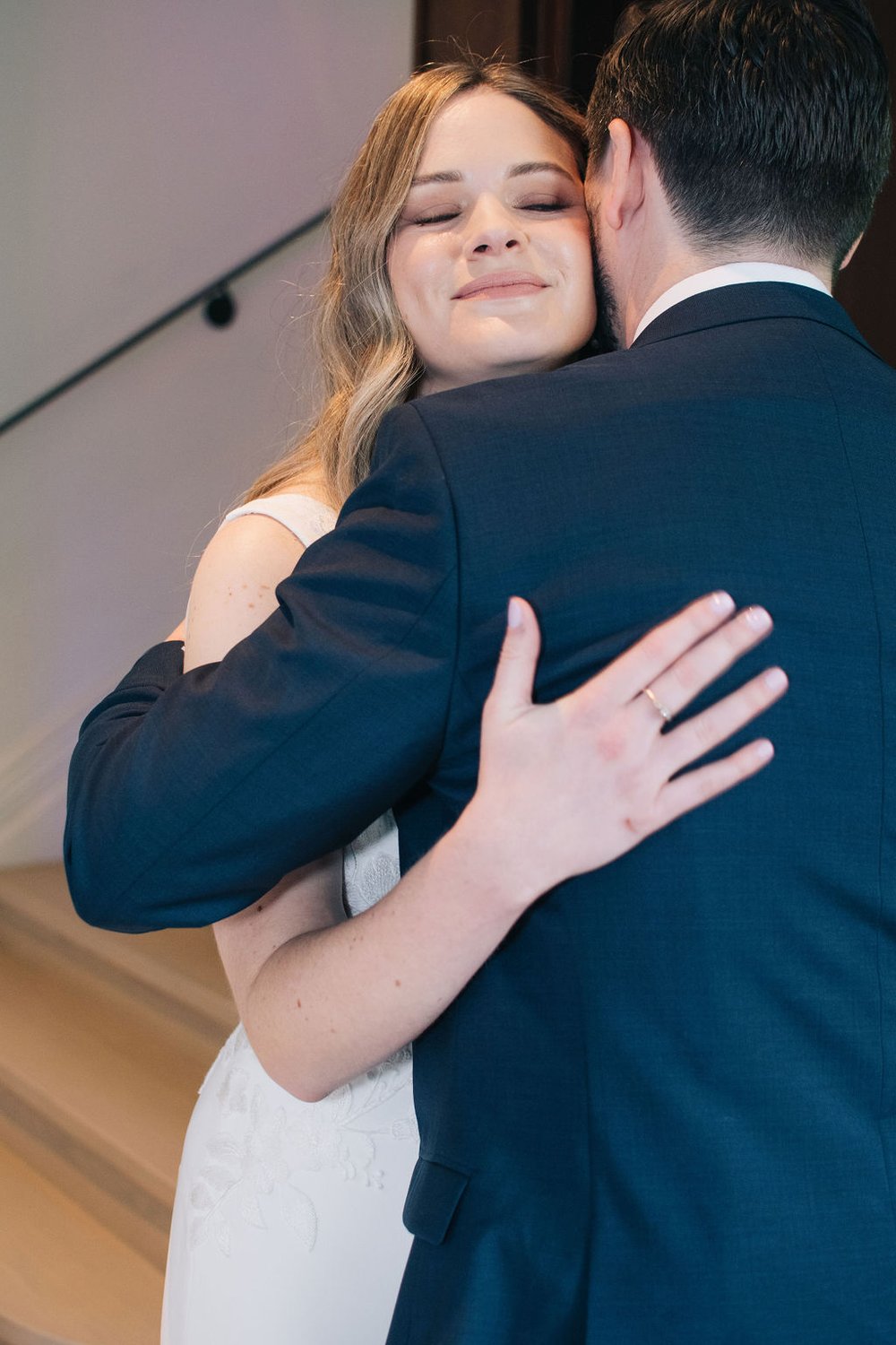 Joyous Gladstone House first look with bride and groom photographed by Toronto wedding photographers, Ugo Photography