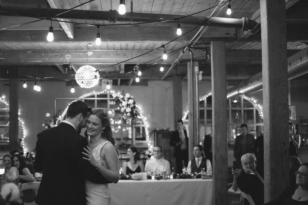 Heartfelt first dance for Toronto bride and groom photographed by Toronto wedding photographers, Ugo Photography
