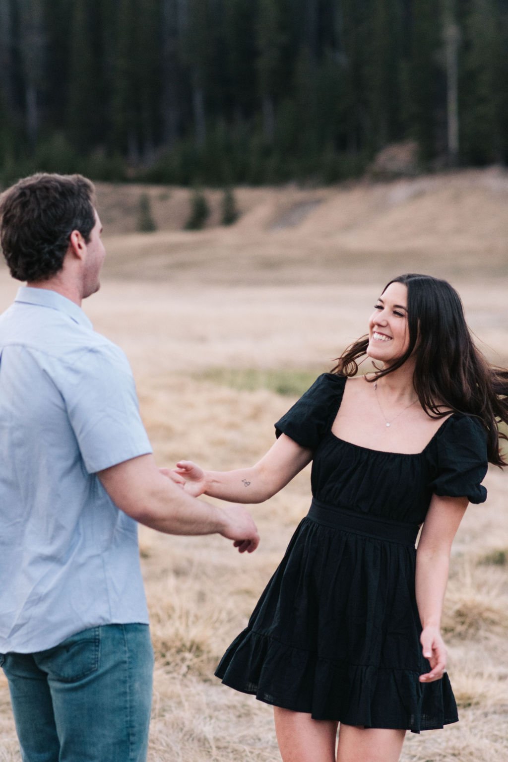 Joyous engagement session in Banff National Park photographed by Niagara wedding photographers, Ugo Photography