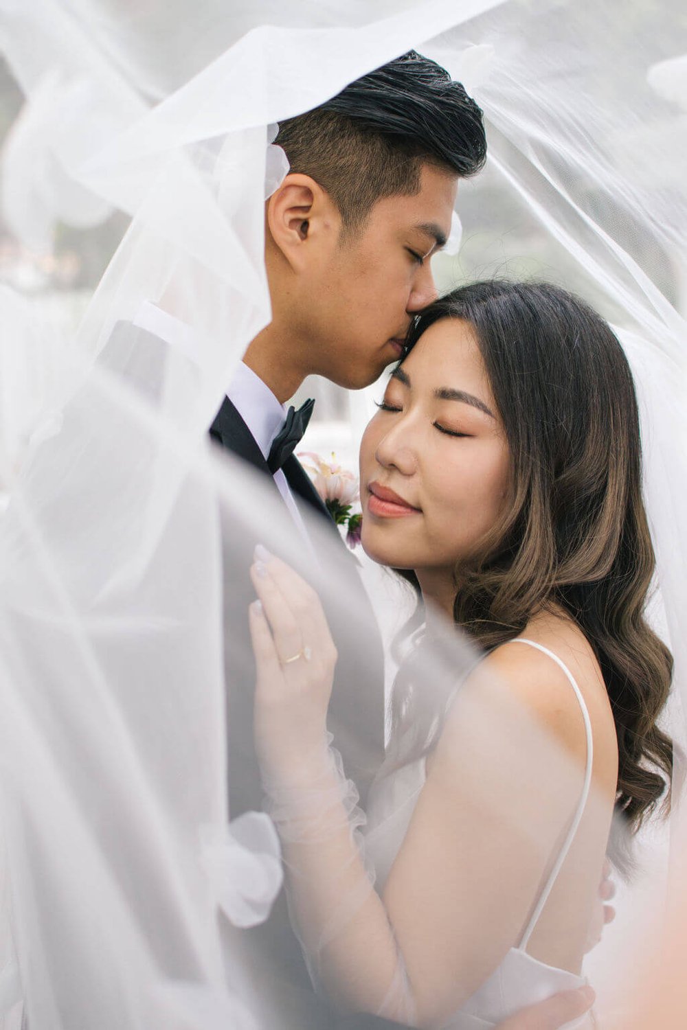 Modern romance for bride and groom's chic summer wedding at The Doctor's House