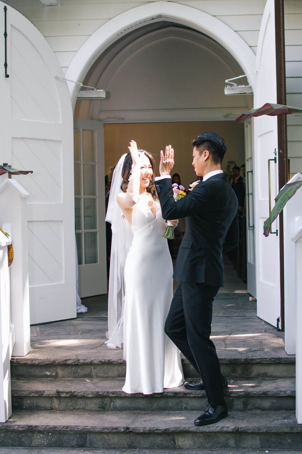 Modern romance for couple's chic summer wedding at The Doctor's House