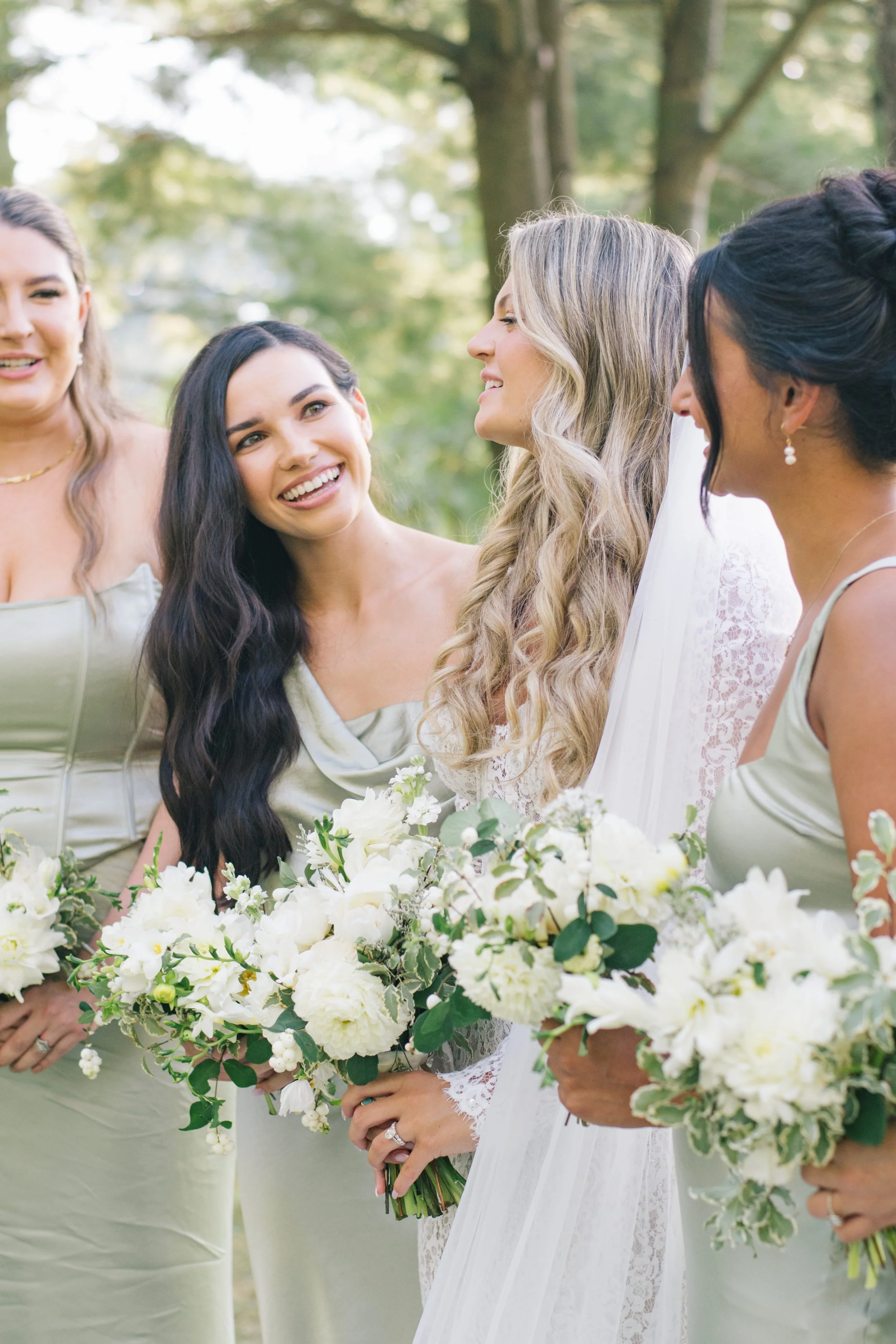 bride-laughing-with-bridesmaids-cottage-country-wedding-ontario