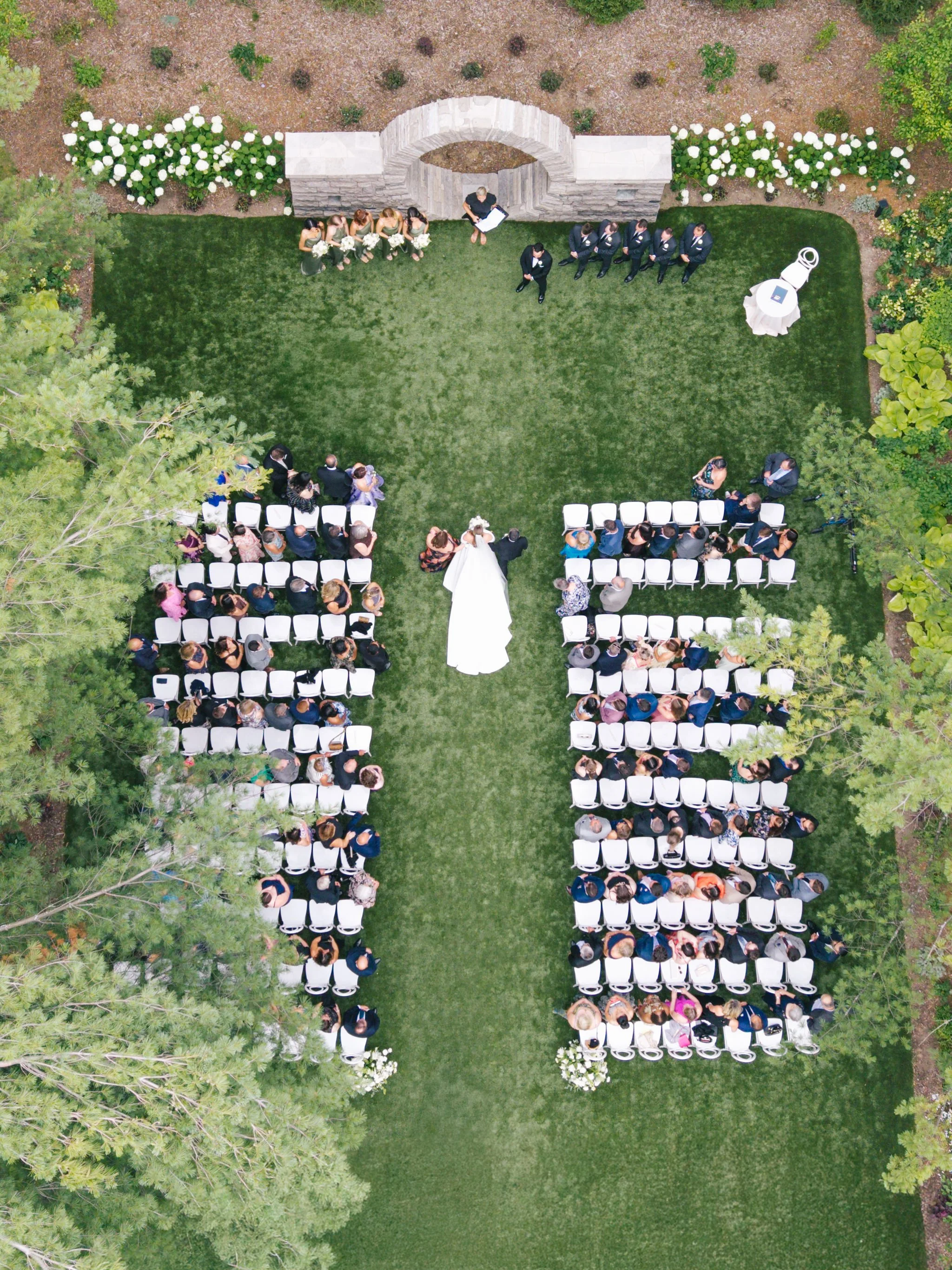 aerial-drone-wedding-photography-bride-aisle-three-feathers-terrace