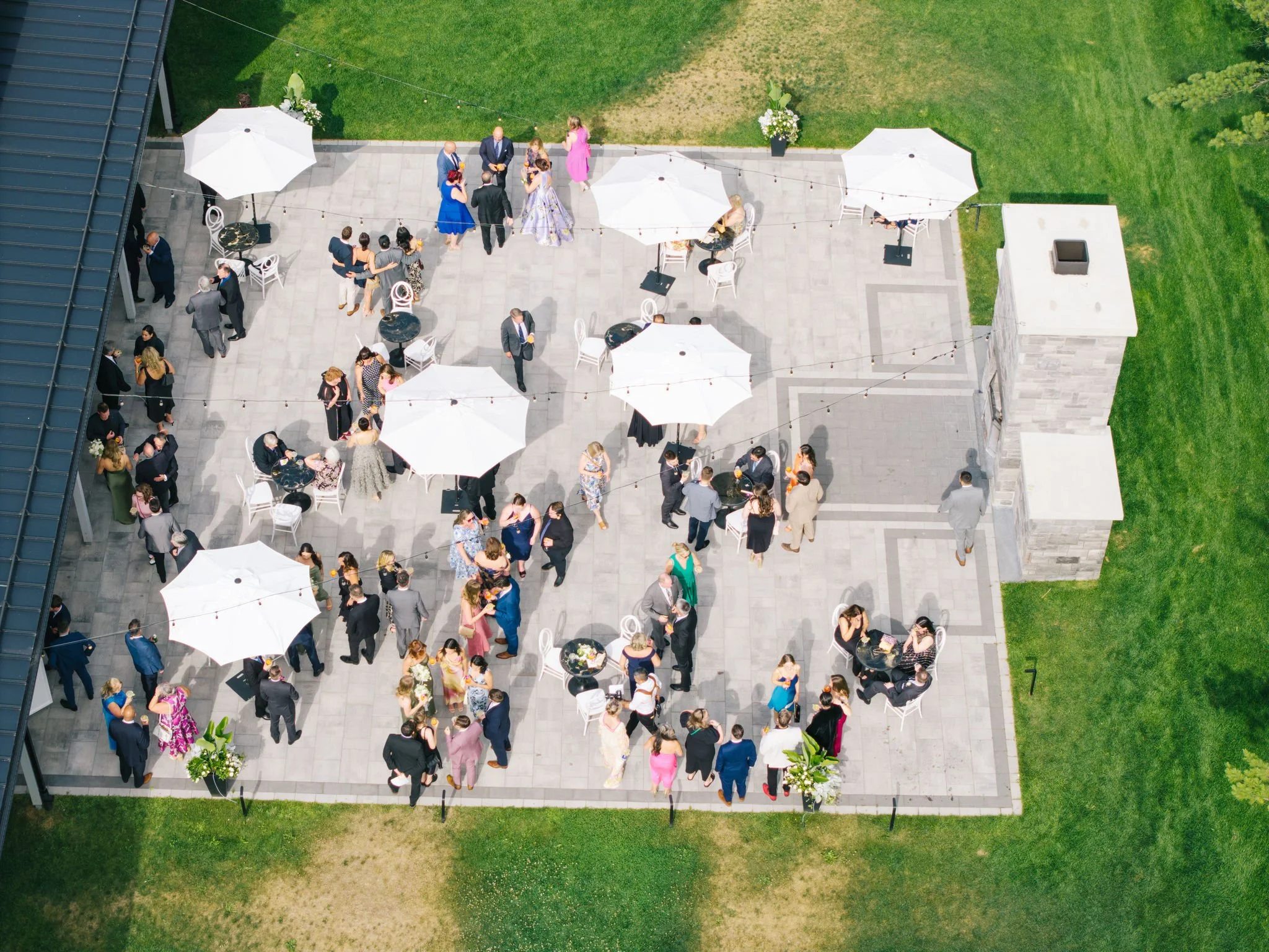 three-feathers-terrace-cocktail-hour-patio-aerial