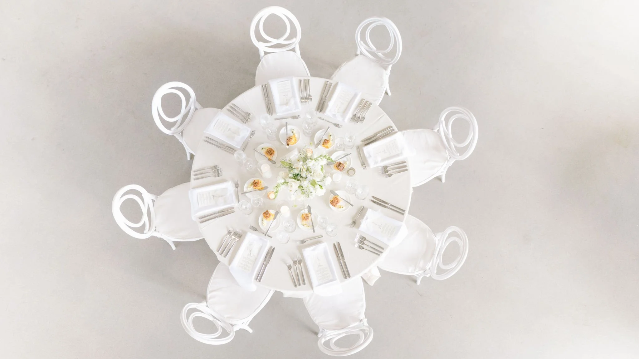 modern-white-wedding-reception-table-setting-overhead