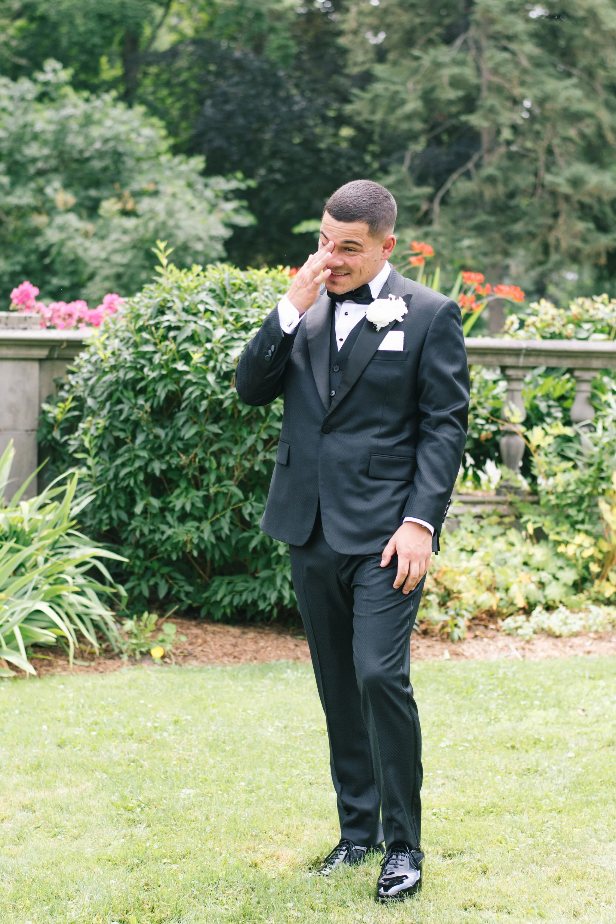emotional-groom-reaction-first-look-black-tie-wedding