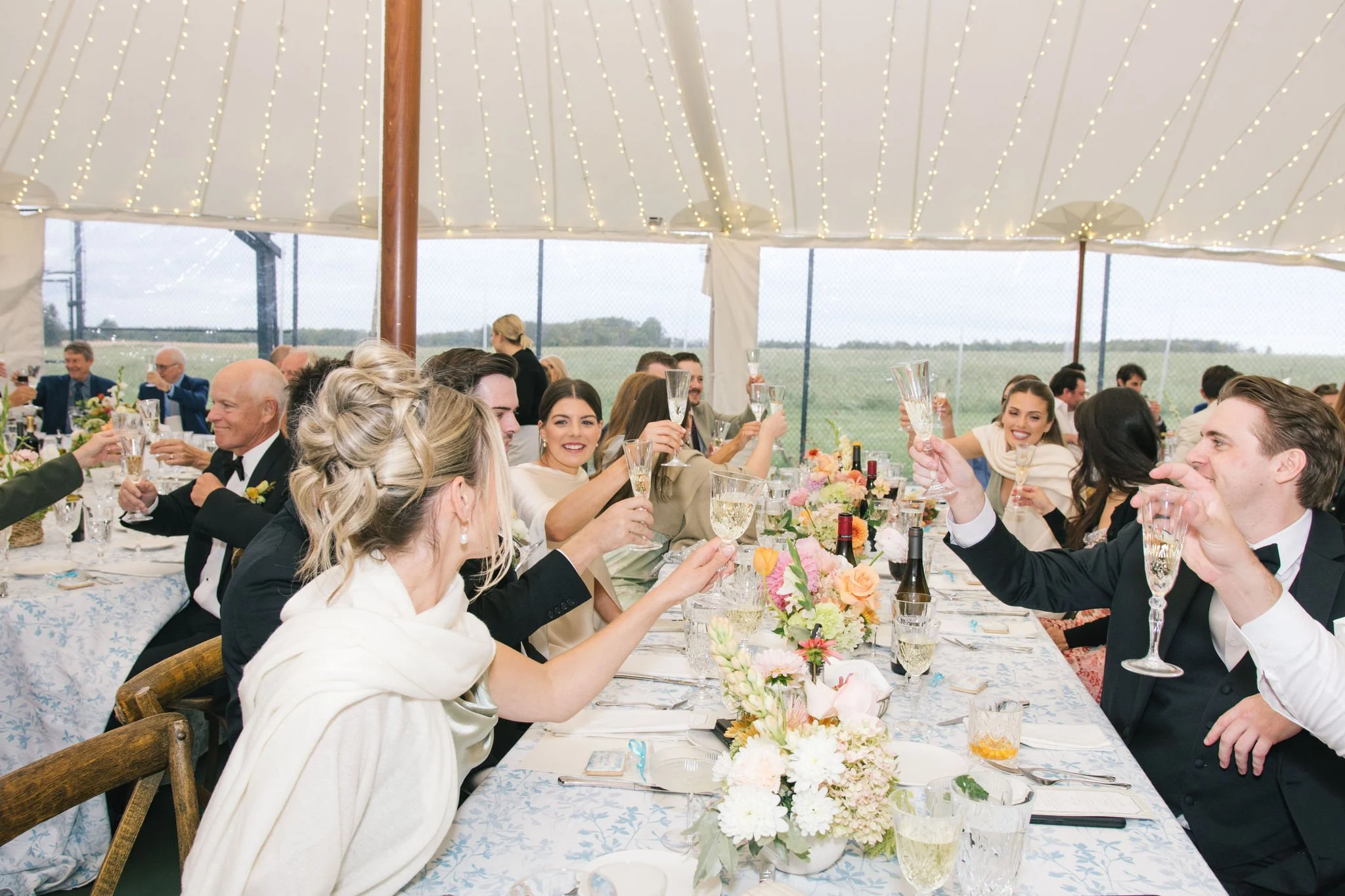 wedding-reception-toast-tented-estate-collingwood-ontario