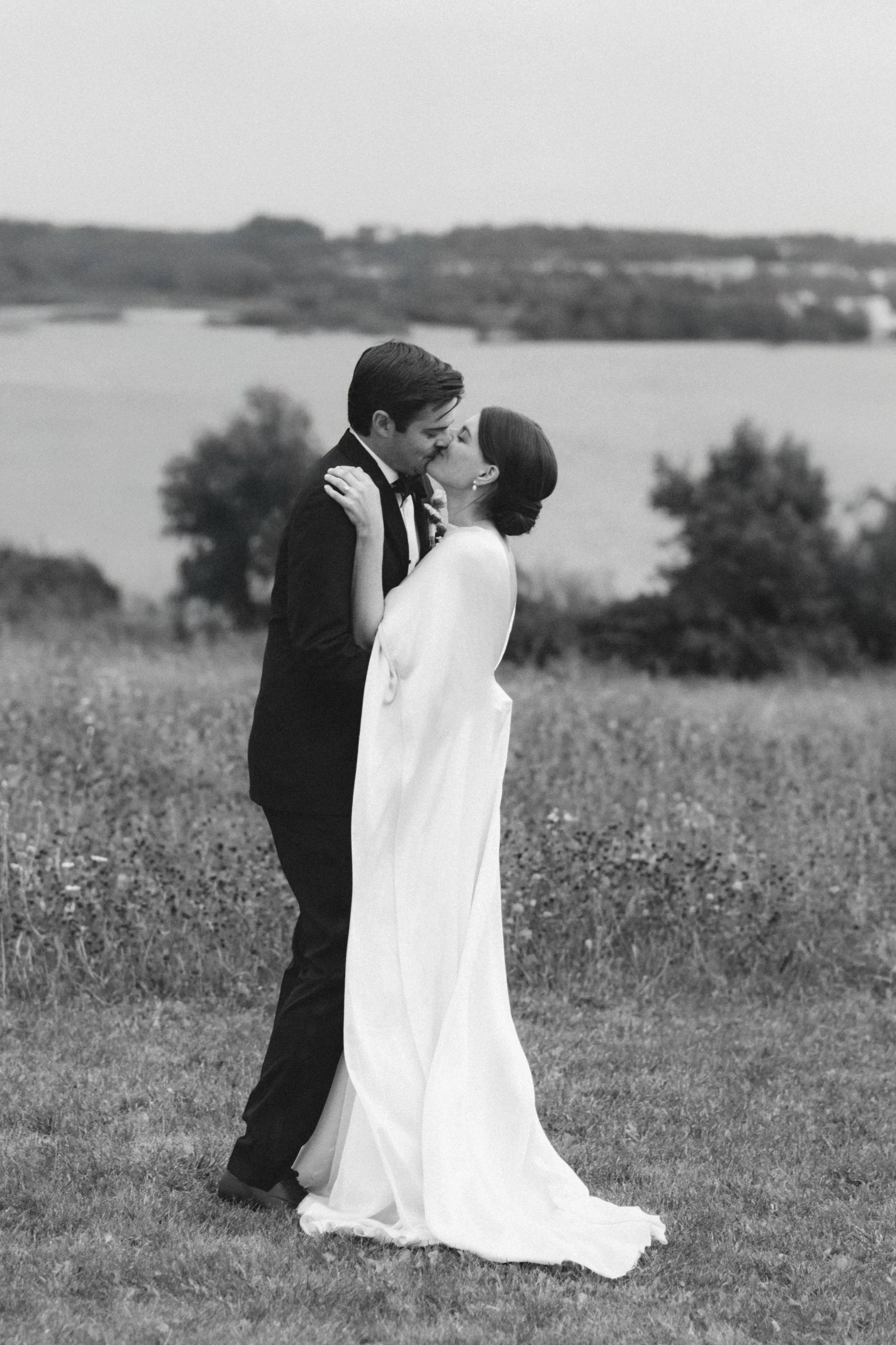 romantic-wedding-kiss-field-view-collingwood-ontario