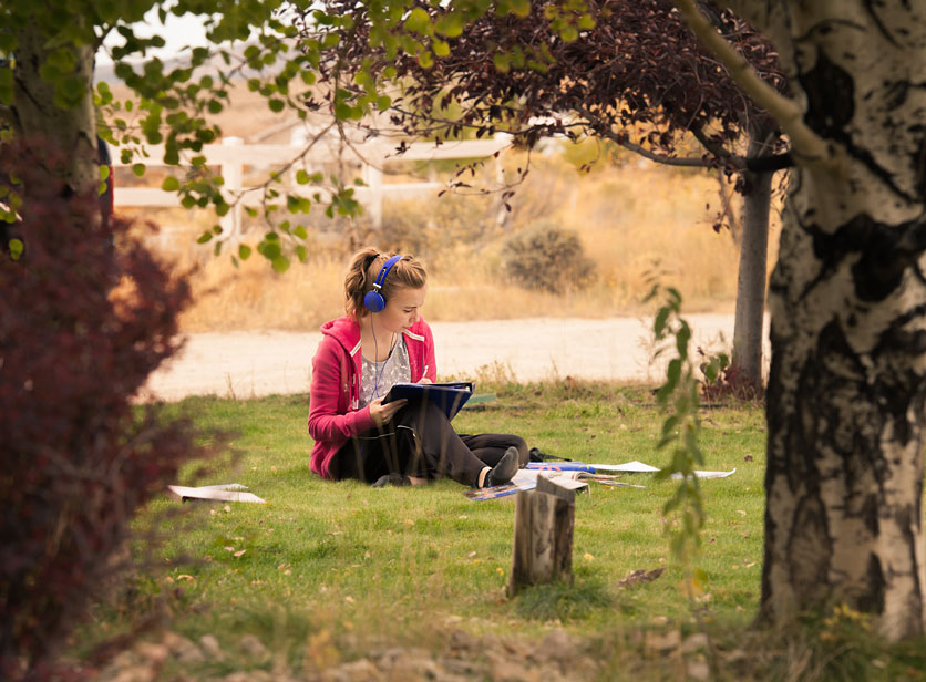 teen-listening-to-music-outside.jpg