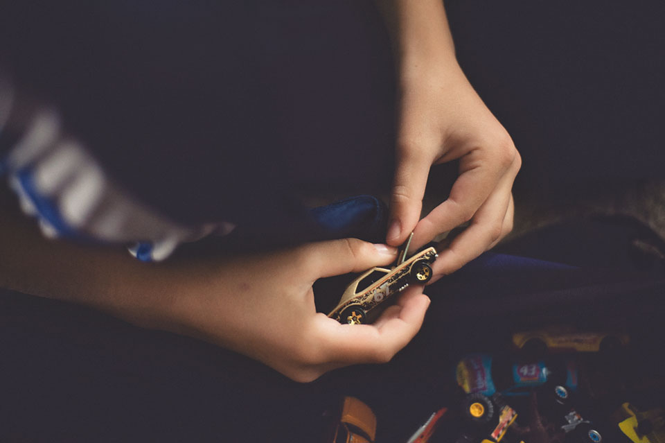 boy-playing-cars-at-home.jpg