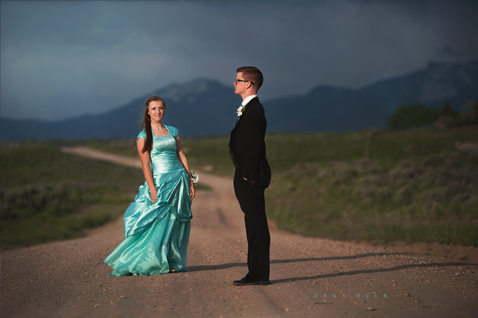 couple dressed up on road