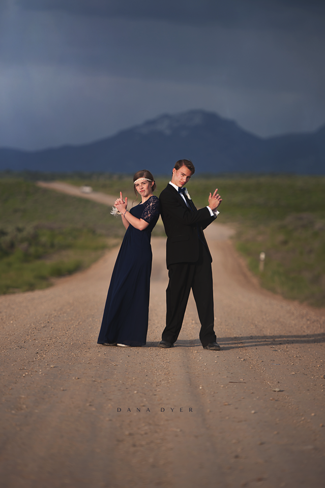 prom photo posed like 007