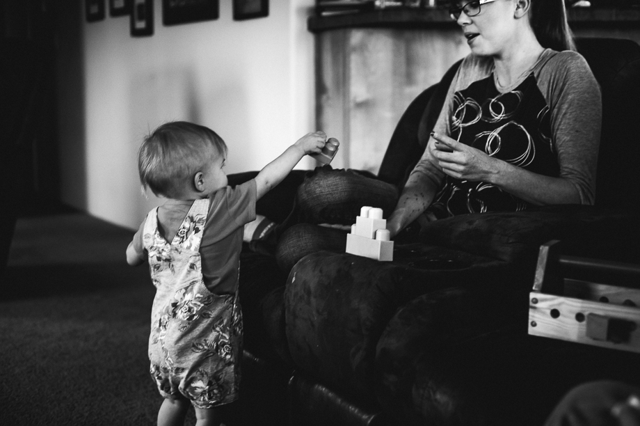 daughter showing mom toy