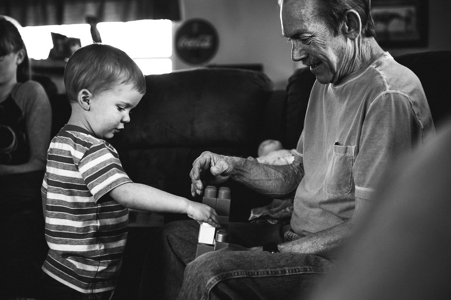 grandpa and grandson playing legos