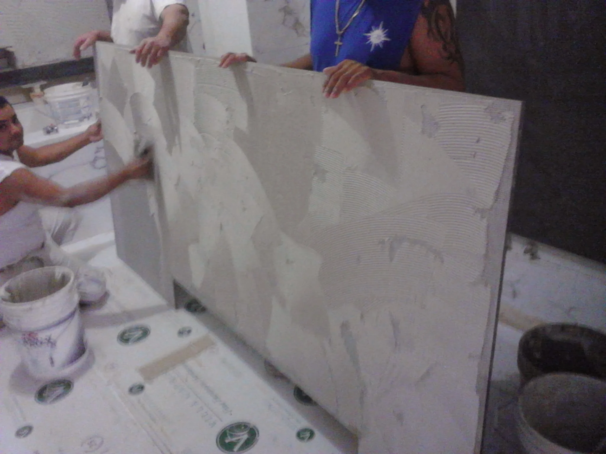  Floating 3D false wall with niche and rap around LED lighting. Material white vein marble 