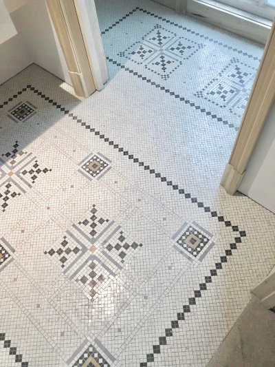 Geometric powder room floor mosaic by Katherine Forst Mosaics