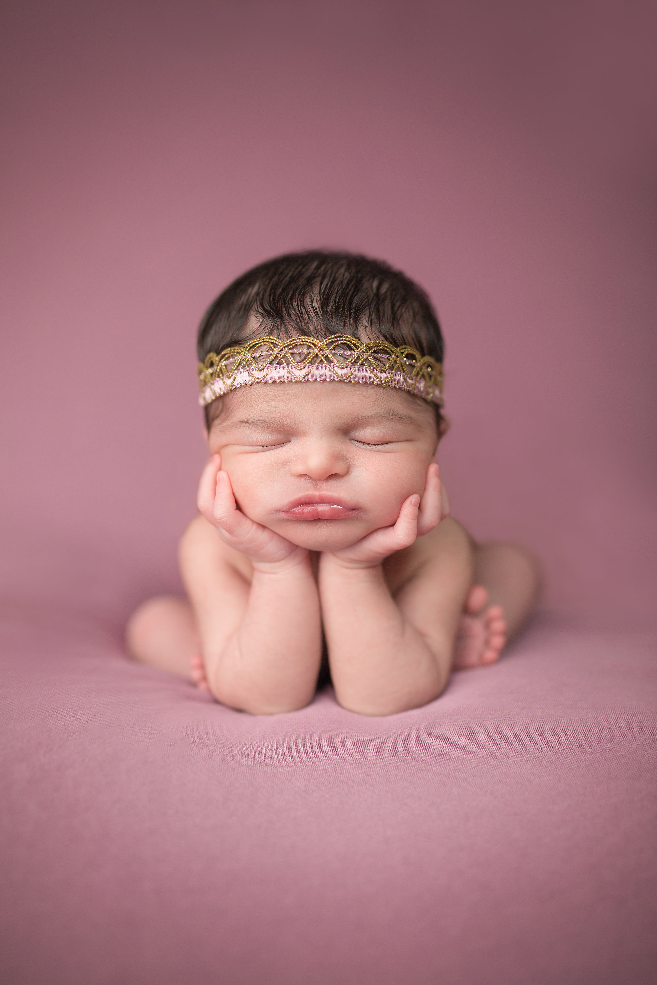 Newborn in "Froggy Pose"