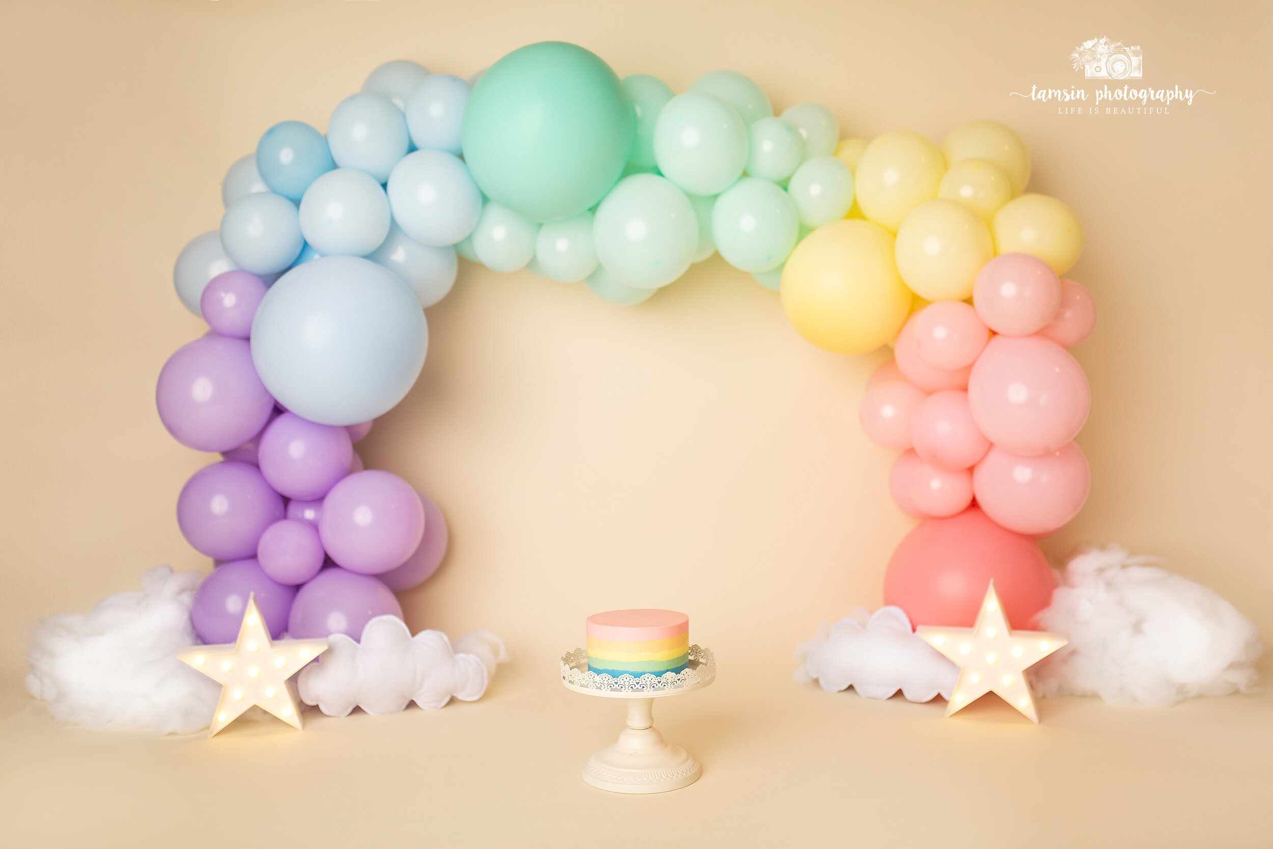 Rainbow Cake Smash Scene Tamsin Photography Balloon Banner Clouds Stars Girl.jpg