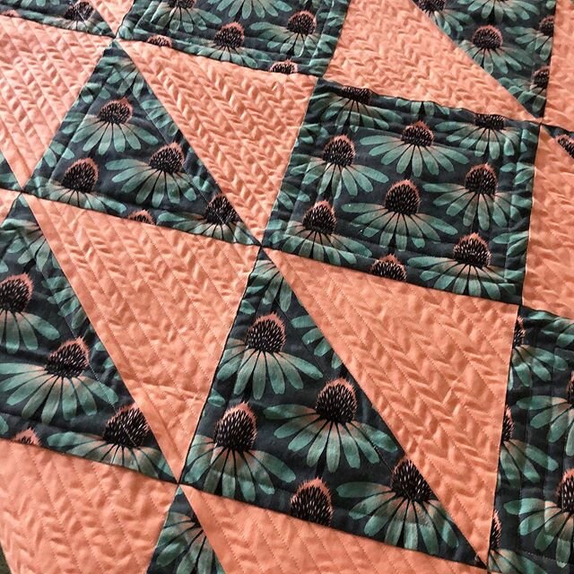 This quilting took me over a week of stop-and-start straight line quilting punctuated by burying threads, staring out the window, and scrolling through social media. When I was done I had this weirdly consistent extra texture I don&rsquo;t remember o