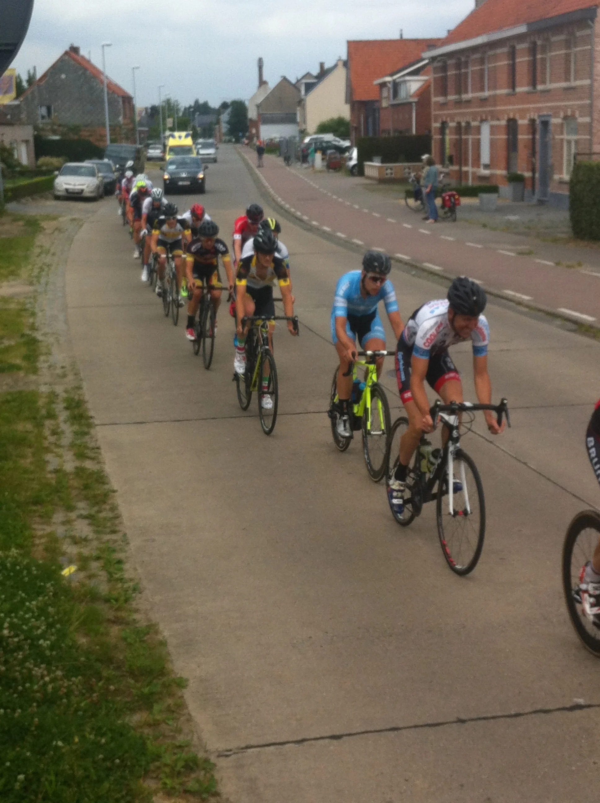 Conor (in red) looking comfortable on Lap3 at Sinaai