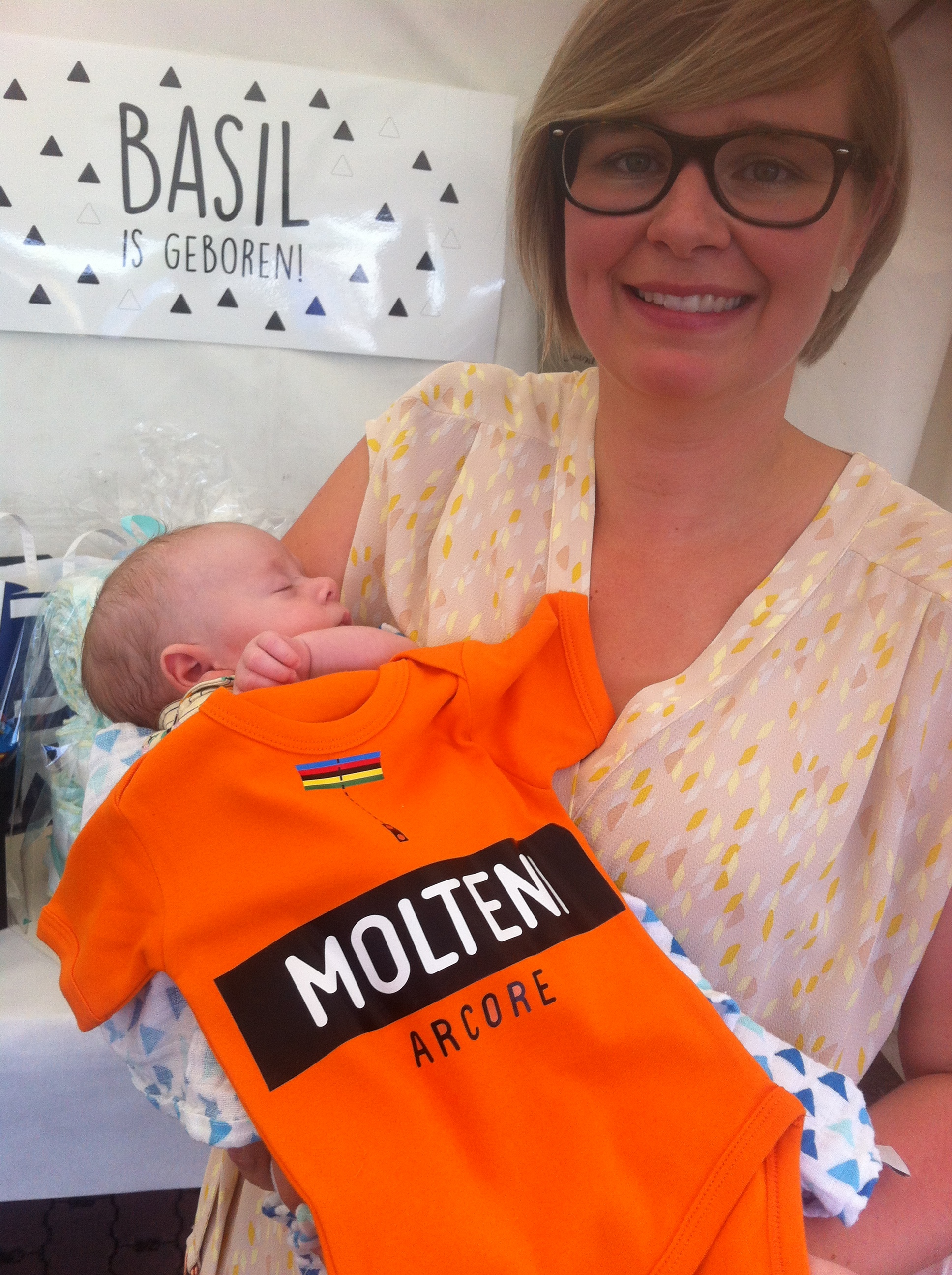 Basil & Jasmine Verhulst at the babyborrel . Basil was presented with his new Molteni Arcore pro team (baby size) jersey for the 2040 Tour of Flanders. Basil refused to comment on Molteni team salary negotiations. 