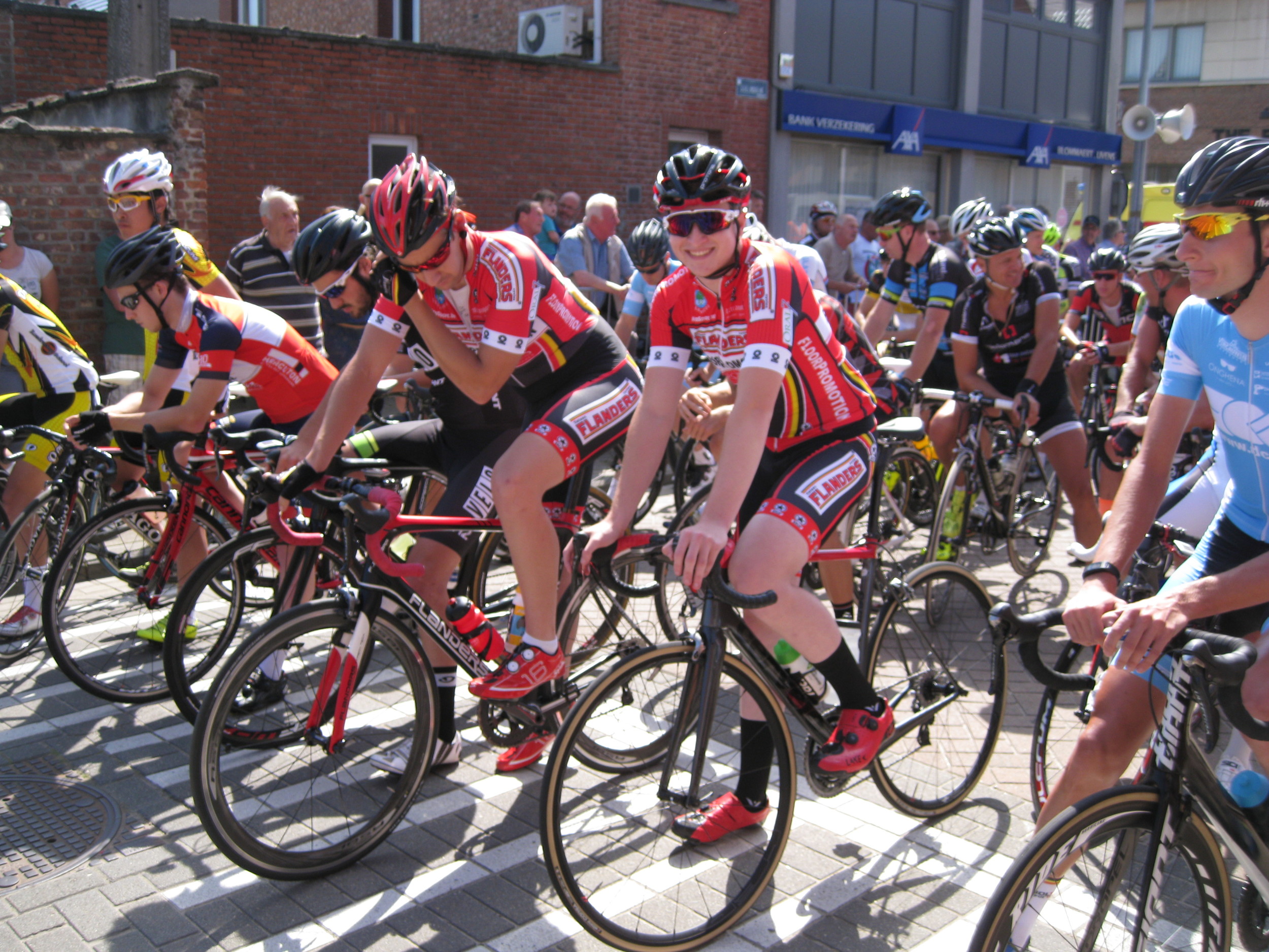 Conor on the Temse Kermis start line with a fellow Flanders Cycles team mate .