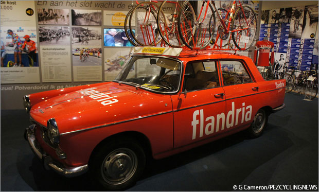 A trip to the Tour of Flanders Museum in Oudenaarde is rewarded with a Flandria Pro Team car (Peugeot 404) as the prime exhibit. The matching Flandria team bikes on the roof are a nice touch. Maybe Belgium was too cold in the Spring Classics as the back rear door for the mechanic was intact. 