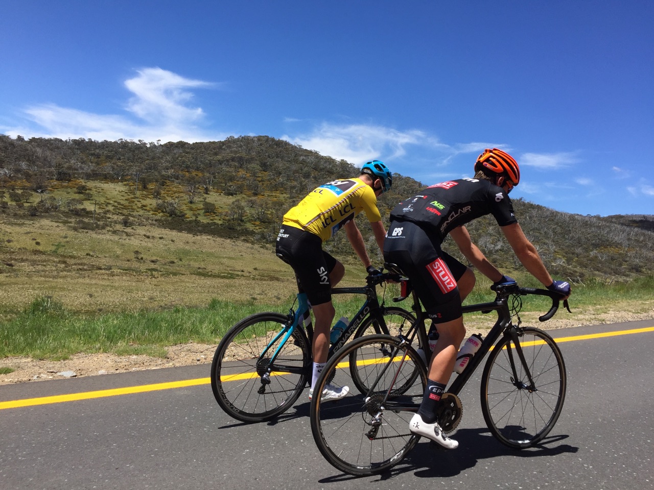 Chris Froome on the long Perisher climb (note the yellow snow road markings)