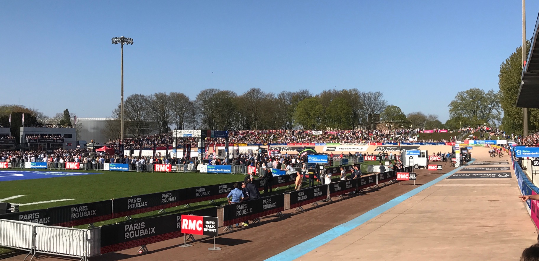Paris Roubaix 17 - A short drive from Viesly and the BiciSport team decamped inside the Roubaix Velodrome some 75 metres from the finish. The Velodrome was packed all hoping to see Tom Boonen take the win but it was not to be. The small group pictured on the Velodrome just received the bell lap.
