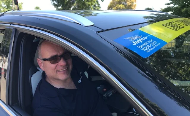 HST 19 @ Friday @ Warragul - Alex Simmons (BiciSport) on his 5th Herald Sun Tour and acknowledged as the premier convoy driver in the country