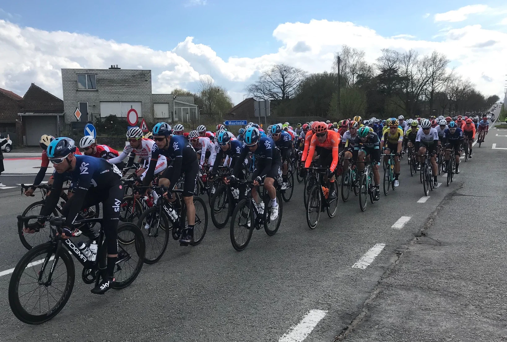Dwars door Vlaanderen (Straight across Flanders) @ 3 April - The peloton approaches Oudenaarde. Photo MOR Dwars Ride Report @ 3 April The Ronde is only 4 days away and the buzz is everywhere. This is the last chance to see the professionals and the Dwars goes over several of the climbs used in the Ronde on Sunday. Having said that the Dwars is not an easy race to follow with all the action coming in the last 60k and little opportunity to leapfrog ahead of the race. So we decided to do what we could by bike and see the Dwars twice then back to our Kokerelle B&B for the live tv feed. First pass was just outside Oudenaarde (picture above) then a 15 minute pedal to the Berg Ten Houte cobbled climb. The Berg Ten Houte was an insignificant & poorly surfaced bitumen road that hadn’t been used for cycle racing in years. Similiarly to what happened at the Patersberg …. the road was recently fully rebuilt with brand new cobbles !!. Heck, why not cobbles as it is Flanders after all. The Berg Ten Houte climb is a cobbled delight - short, sharp and an instant Flandrien success story.