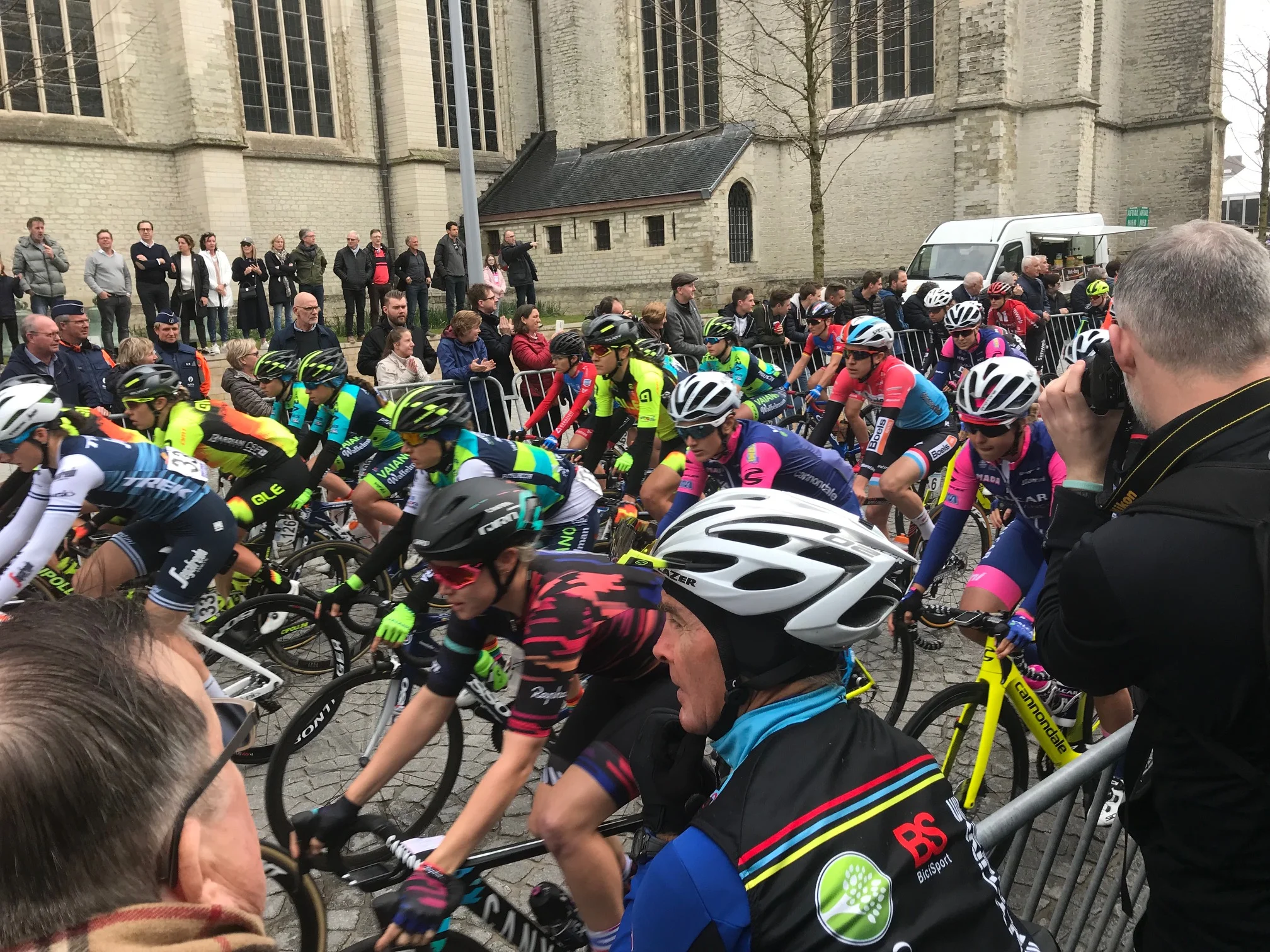 RVV (Tour of Flanders) @ 7 April - Mike Lawson as the Womens RVV peloton starts from central Oudenaarde RVV Report @ 7 April The Ronde defines Belgium is many ways and what a joy to be in this country on this classic day. The BiciSport group (joined by Peter Tomlinson & Ted Anderson from the NSW Southern Highlands Club) headed off the see the Womens Ronde start in Oudenaarde at 11.00am. From there it was a short pedal to the Koppenberg Cafe at Melden, the Kortekeer climb with the pro peloton somewhat asleep, watched the Womens RVV scream off the Patersberg climb, a final peak of Peter Sagan at the base of the Old Kwaremont, then finally a Belgian beer at the Lentrecote Restaurant (thank you to Lucrese Willeart for letting the BiciSport peloton invade your restaurant and watch the live tv finish). The Italians won the day in both races which meant it was a very subdued flemish crowd at the end of a classic day.