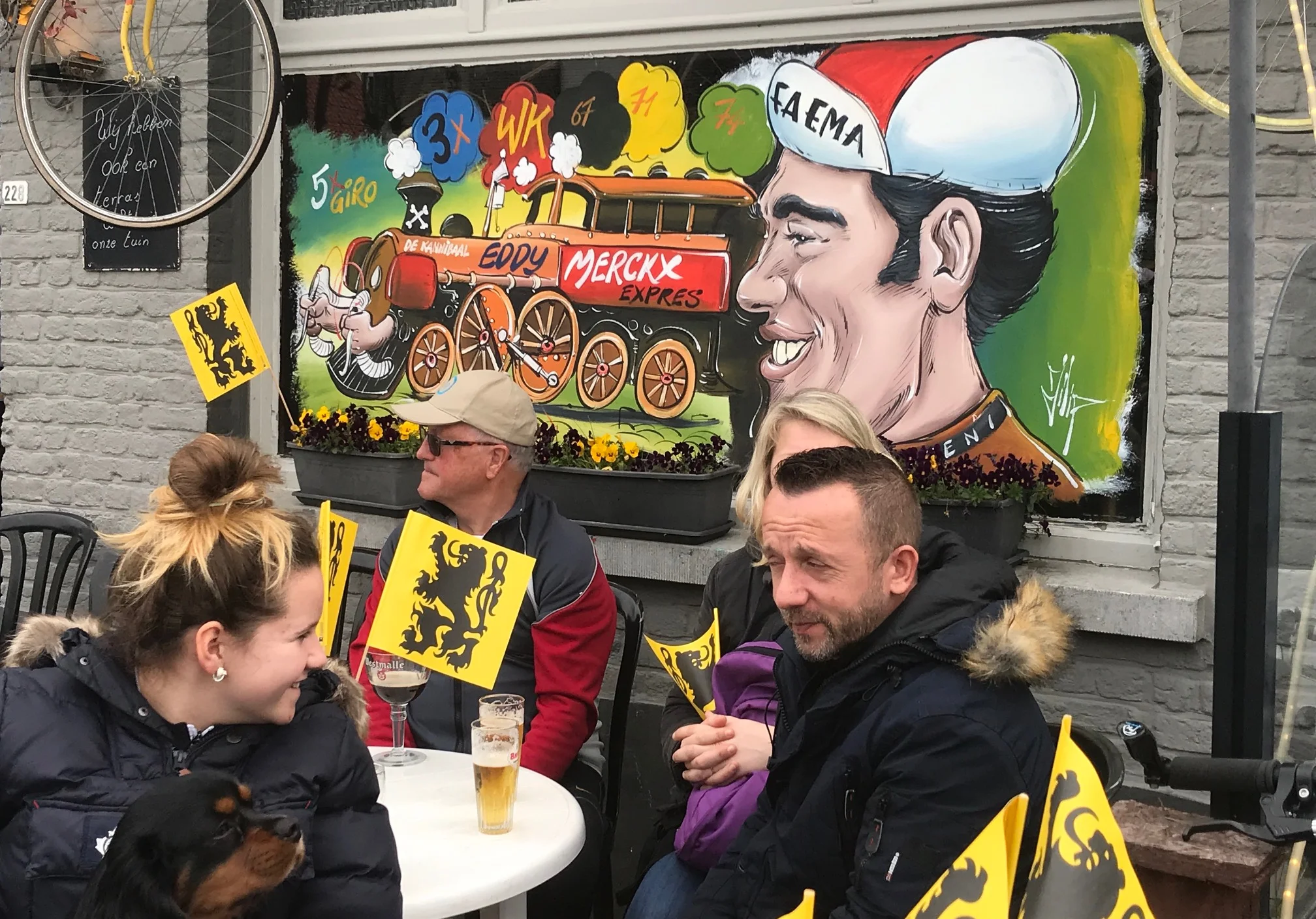 RVV @ 7 April - Eddy Merckx hasn’t retired and lives on at the Koppenberg Cafe. Flanders flags are everywhere.
