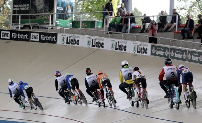 Dernys in action at the Velodrome - Each rider is allocated a derny & the “bigger/fatter” the derny driver the better to assist with slipstreaming (thin drivers need not apply). Clothing rules also apply for derny drivers (drivers are not permitted to intentionally layer up). Hence, “natural layering” the preferred option.