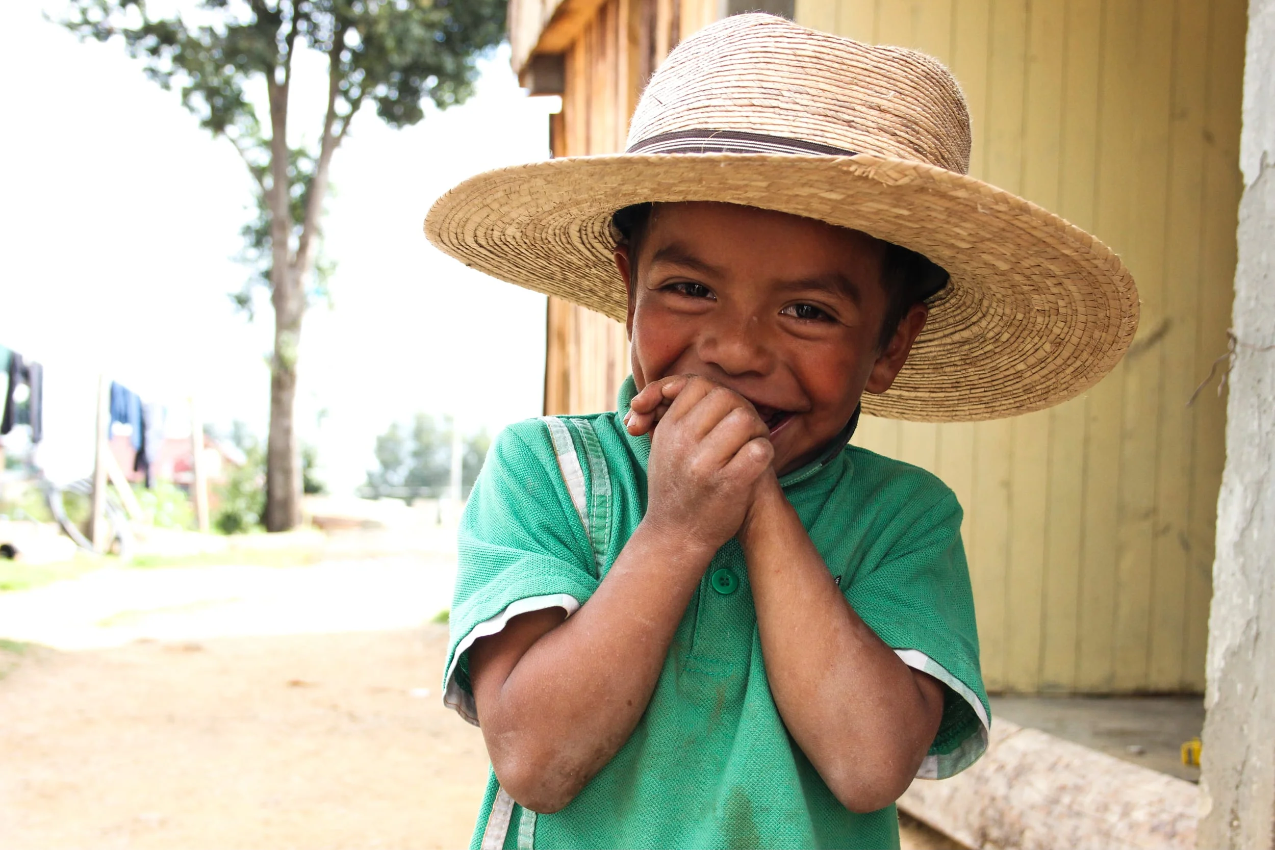 A child in San Jose del Pacifico, Mexico. This small town in the mountains is famed for hallucinogenic mushrooms. While tourists enjoy psychedelics, this child's family earns their living making corn tortillas.