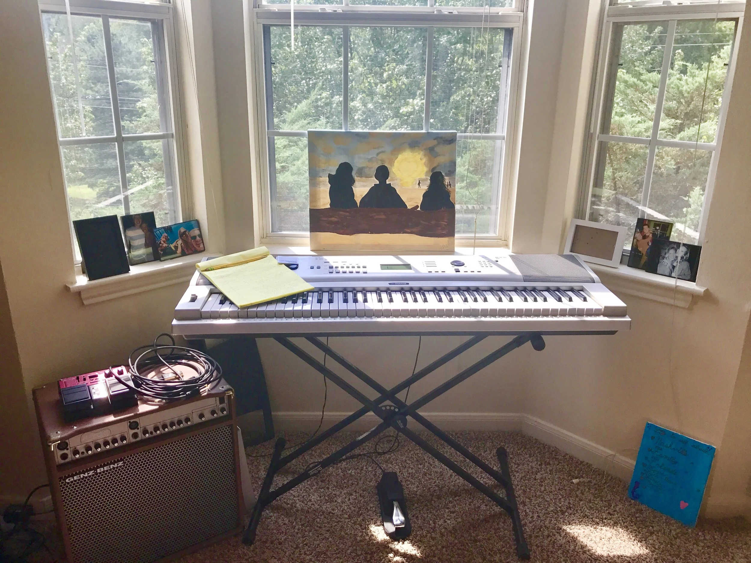 My lovely work space with lovely little windows to match. Featuring photos of some of the people that make my heart happy and a painting I did of one of my favorite memories on the coast of Oregon (The Pacific Northwest has my heart). 