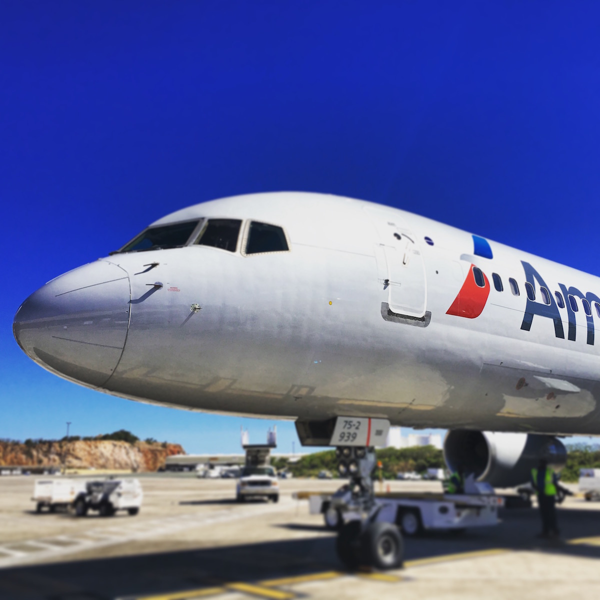 Cheers to the girl that brought us! An American Airlines Boeing 757 sits on the tarmac at Cyril King Airport (STT) on St. Thomas.