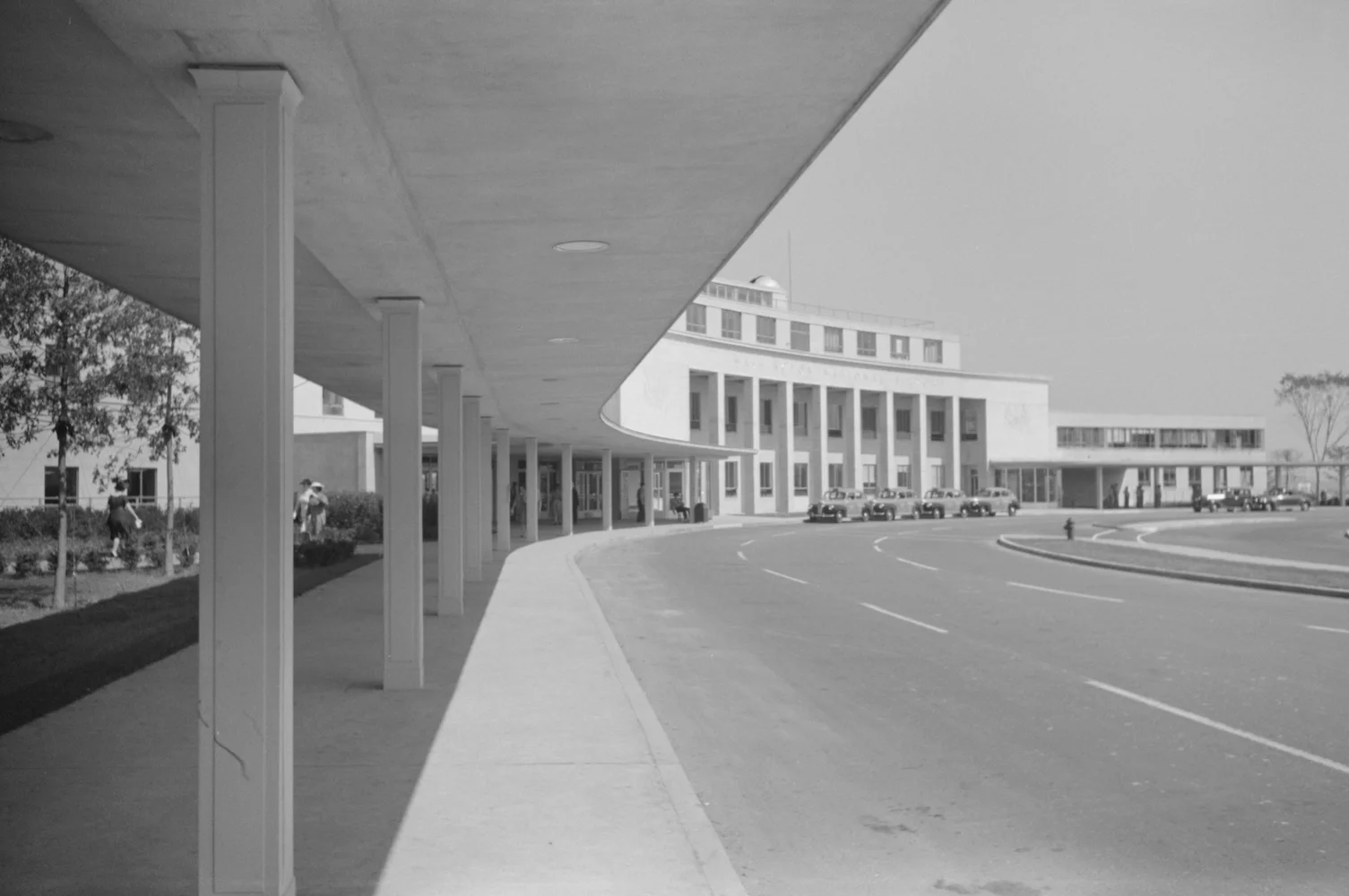 Ronald Reagan Washington National Airport as it was on opening in 1941, long before Reagan's name had been added. The facade of historic Terminal A looks today much as it does then, a monument to a bygone era when air travel was a more glamorous affair of fancy hats and suits. DCA was listed on the National Register of Historic Places in 1997.